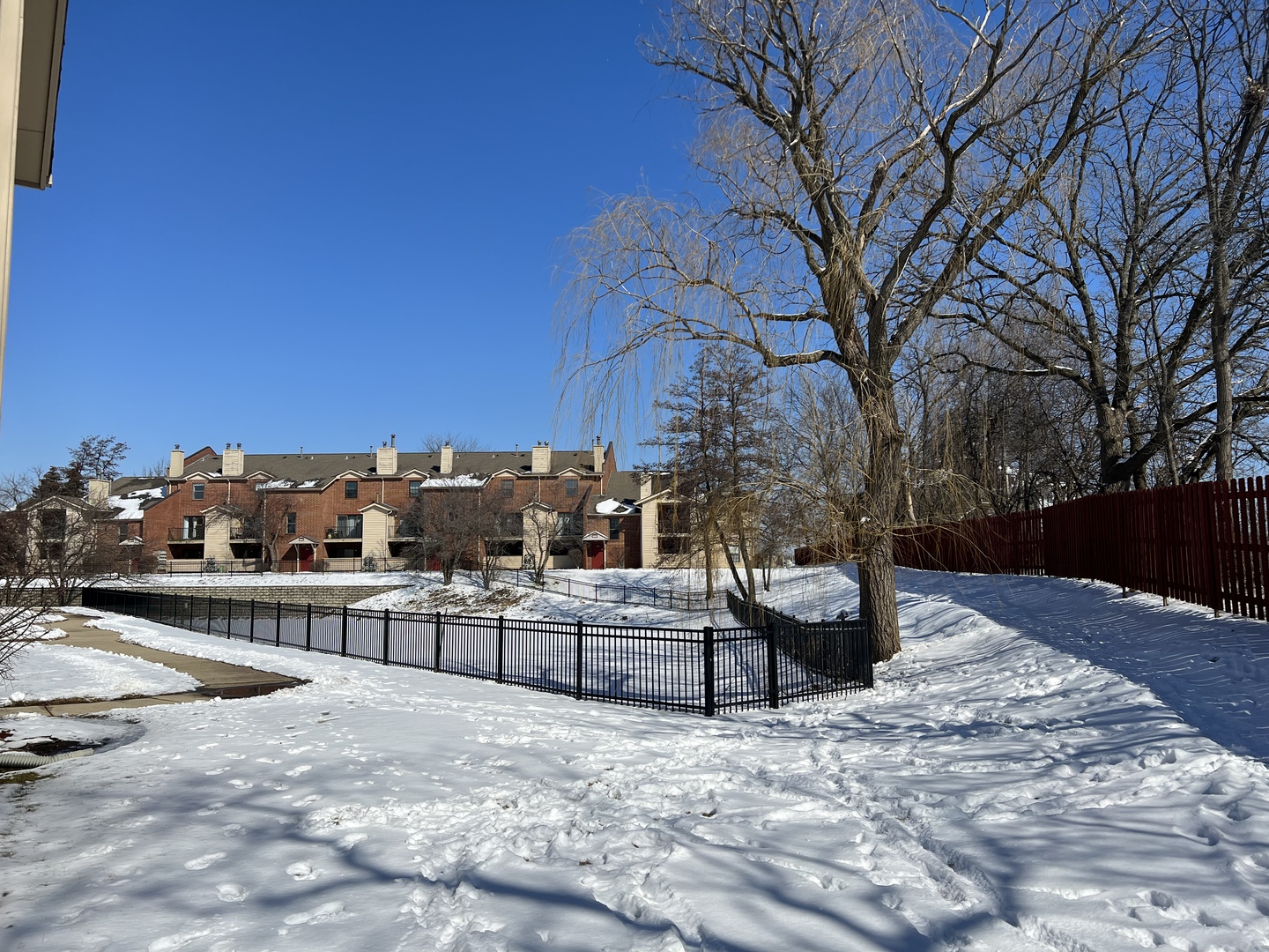 1931 North Hicks Road, Unit 211 Palatine, IL 60074 - Photo 18 of 18 a view of a backyard of the house