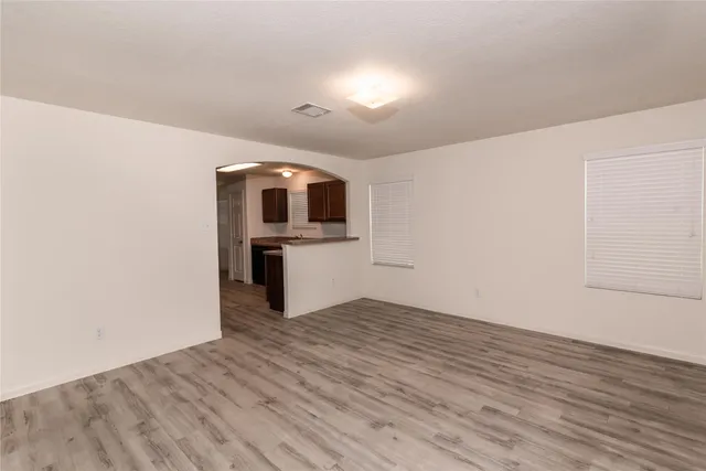 a view of kitchen with wooden floor