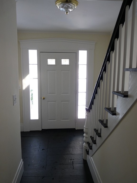 478-480 Gleasondale Road Stow, MA 01775 - Photo 2 of 10 a view of entryway with wooden floor and stairs