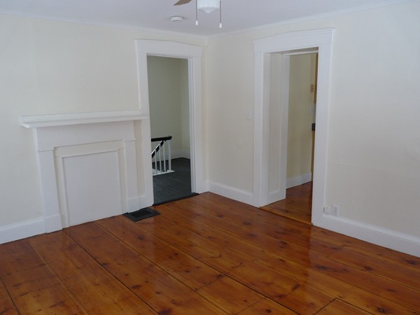 478-480 Gleasondale Road Stow, MA 01775 - Photo 7 of 10 a view of empty room with wooden floor