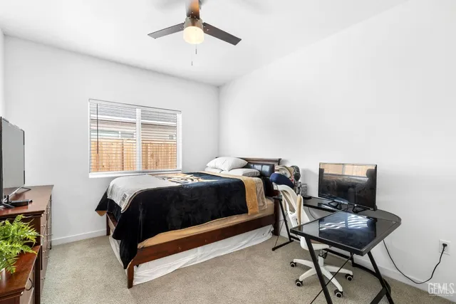 a close view of sink and a potted plant