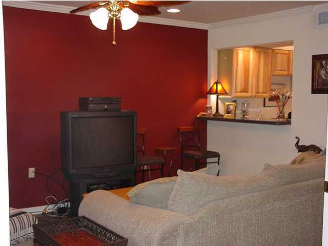 210 Pelham Road, Unit B104 Fort Walton Beach, FL 32547 - Photo 2 of 9 a bedroom with bed and window