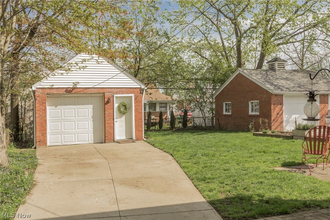 4189 Ellison Road South Euclid, OH 44121 - Photo 35 of 41 A seasonal picture of the garage with special person door