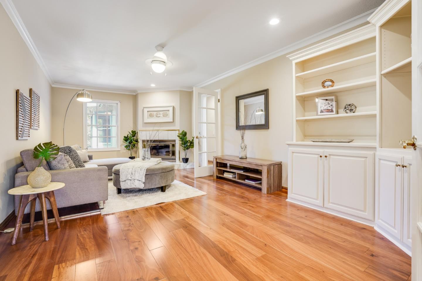 715 Pineview Drive San Jose, CA 95050 - Photo 14 of 34 a living room with furniture a fireplace and a flat screen tv