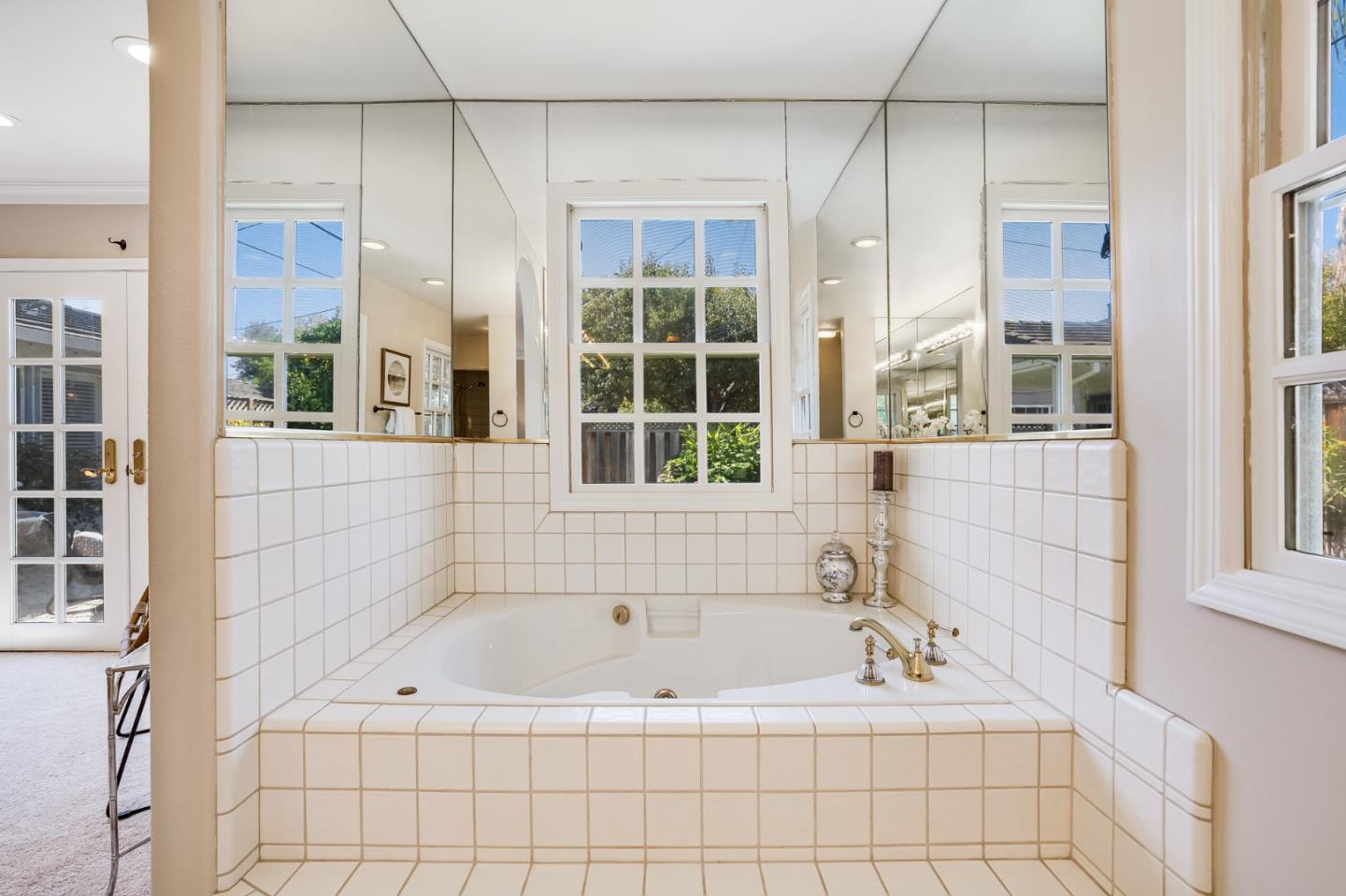 715 Pineview Drive San Jose, CA 95050 - Photo 25 of 34 a bath tub sitting next to a window