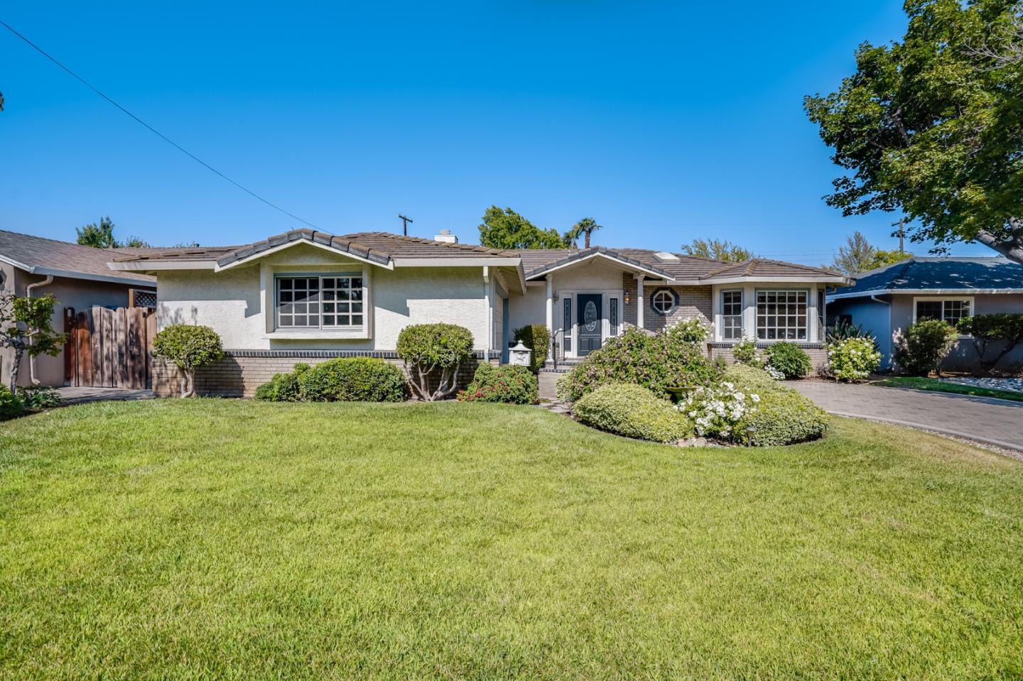 715 Pineview Drive San Jose, CA 95050 - Photo 3 of 34 a front view of a house with a yard