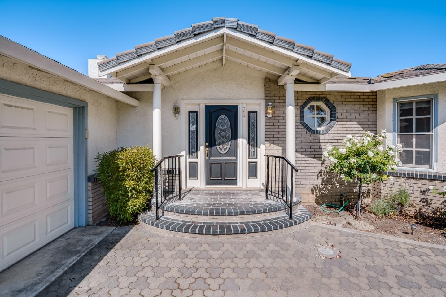 715 Pineview Drive San Jose, CA 95050 - Photo 5 of 34 a view of a house with potted plants and a yard
