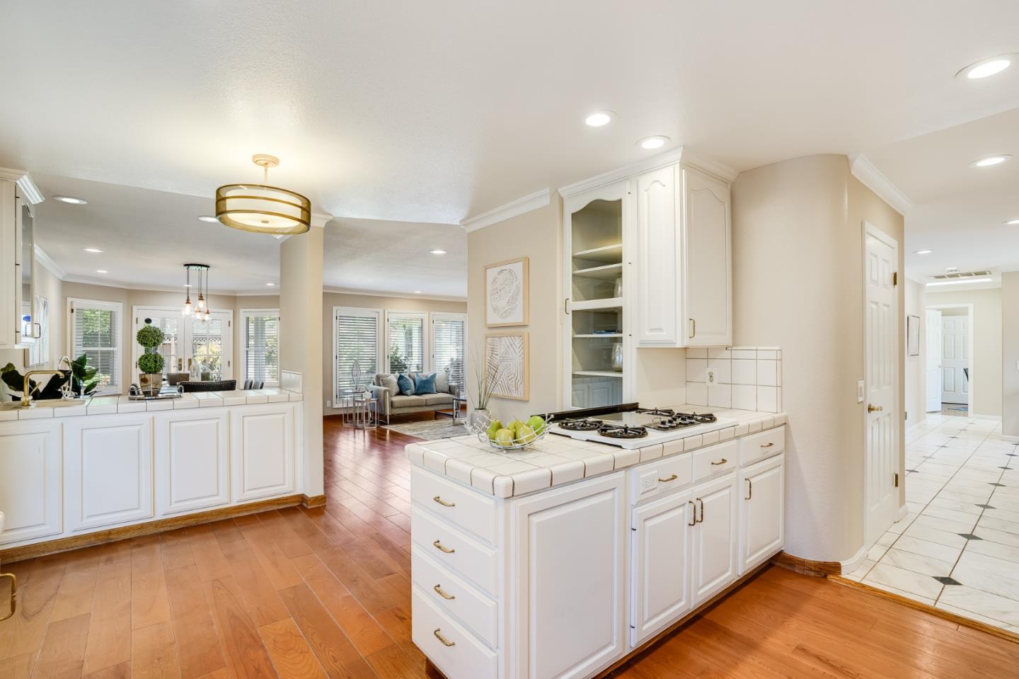 715 Pineview Drive San Jose, CA 95050 - Photo 10 of 34 a kitchen with stainless steel appliances granite countertop a stove a sink and a refrigerator