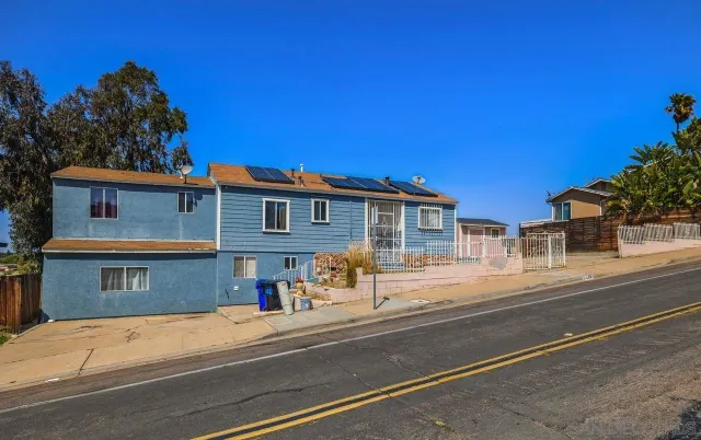 a view of a building with a street