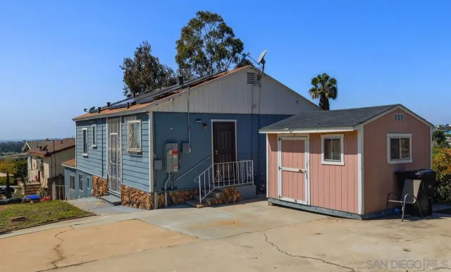 a front view of a house with a garage