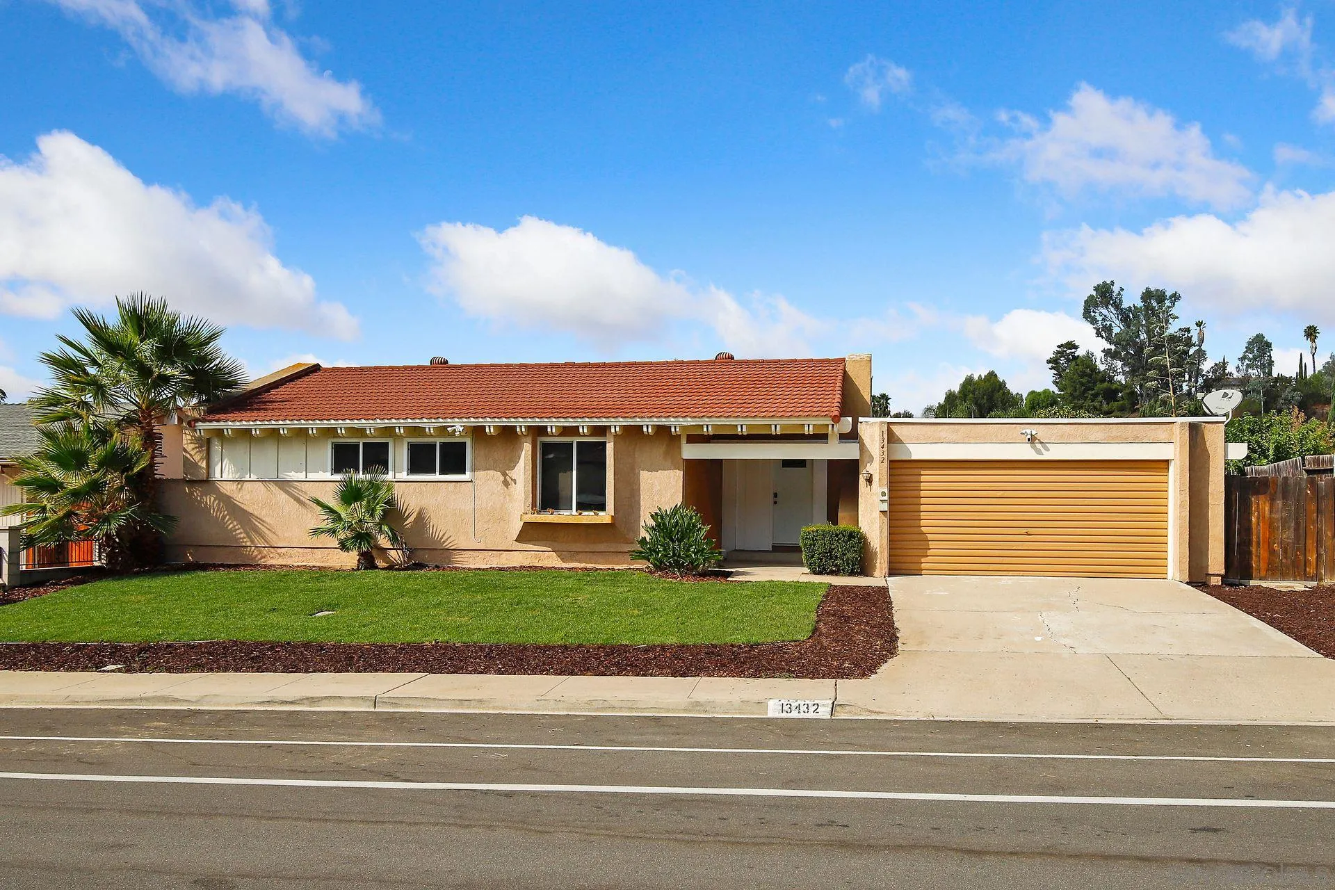 13432 Carriage Road Poway, CA 92064 - Photo 2 of 27 a view of front of house with yard