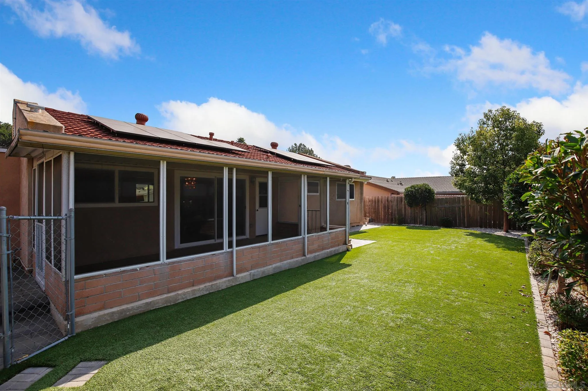 13432 Carriage Road Poway, CA 92064 - Photo 25 of 27 a view of an house with backyard space and balcony