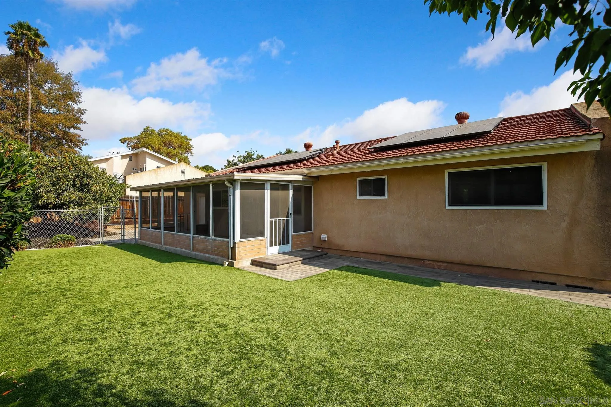 13432 Carriage Road Poway, CA 92064 - Photo 26 of 27 a view of a house with backyard and sitting area