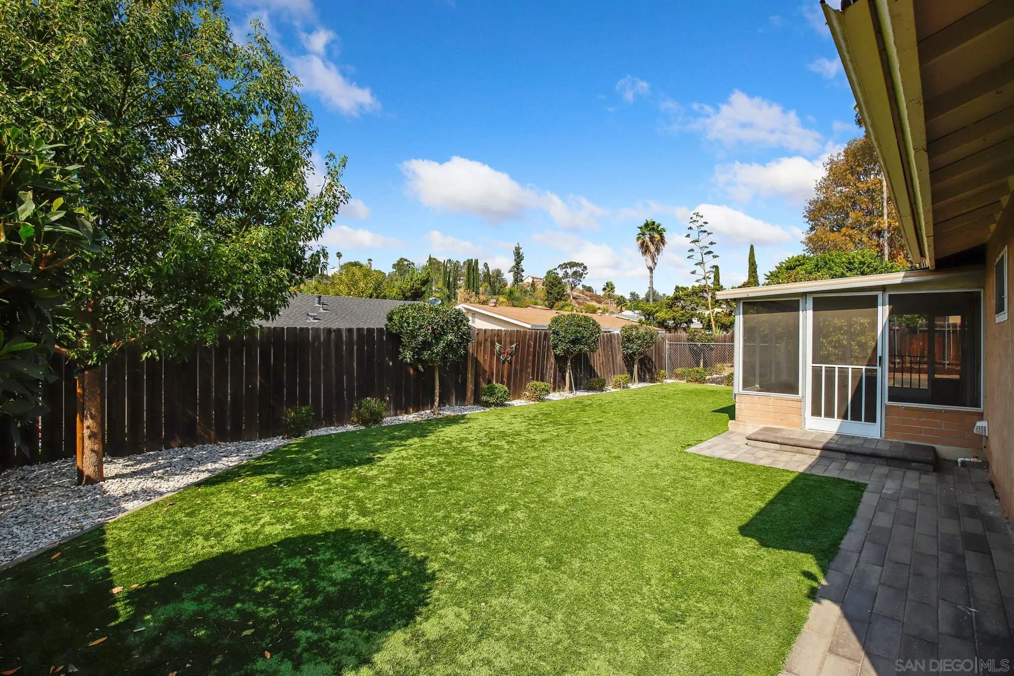 13432 Carriage Road Poway, CA 92064 - Photo 27 of 27 a view of a house with backyard and a garden