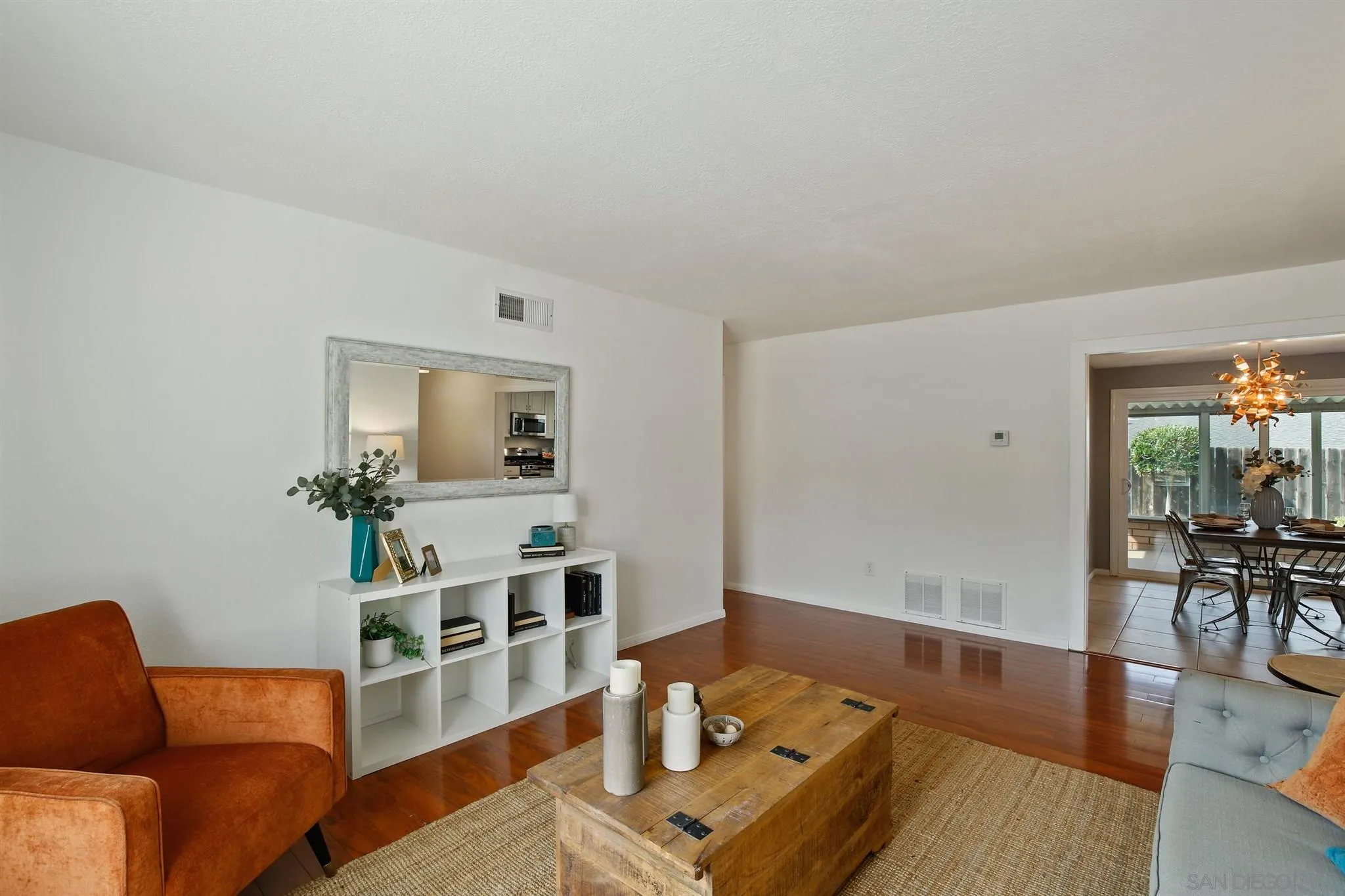 13432 Carriage Road Poway, CA 92064 - Photo 6 of 27 a living room with furniture and wooden floor