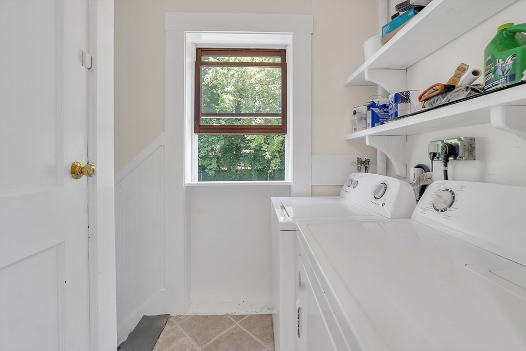 31 Justin Road, Unit 3 Boston, MA 02135 - Photo 28 of 32 a bedroom with a bed and a window