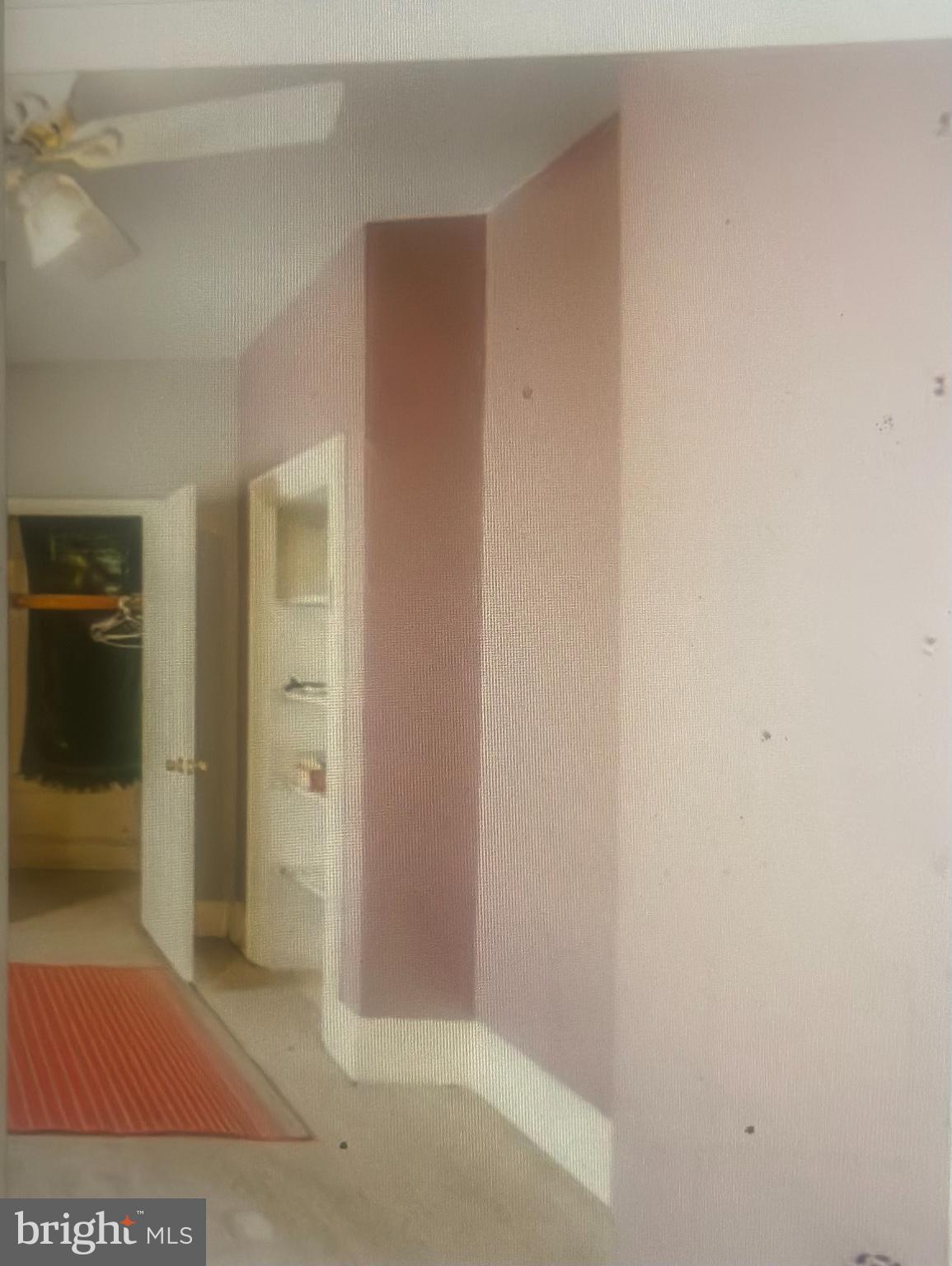 1925 North 23rd Street Philadelphia, PA 19121 - Photo 5 of 11 an empty room with an entrance to other room