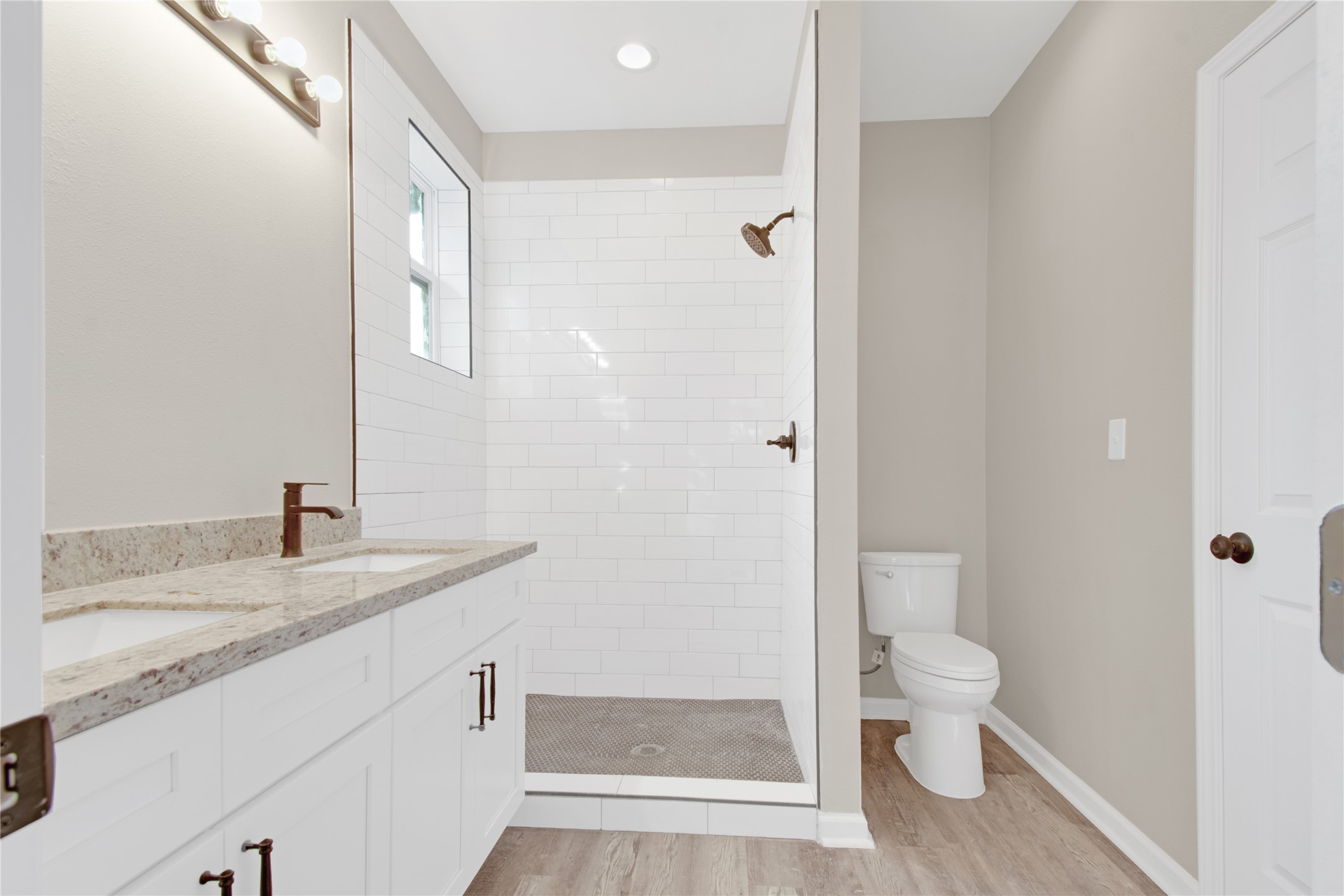4913 Single Shot Circle, Unit B Austin, TX 78723 - Photo 13 of 21 a bathroom with a granite countertop sink toilet and shower