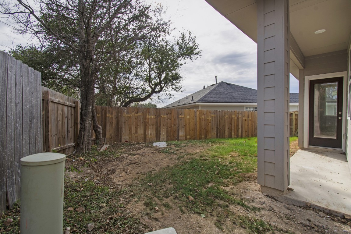 4913 Single Shot Circle, Unit B Austin, TX 78723 - Photo 20 of 21 a view of a backyard