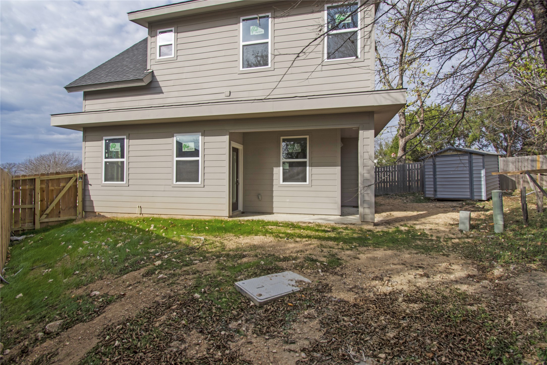 4913 Single Shot Circle, Unit B Austin, TX 78723 - Photo 21 of 21 a front view of a house with garden