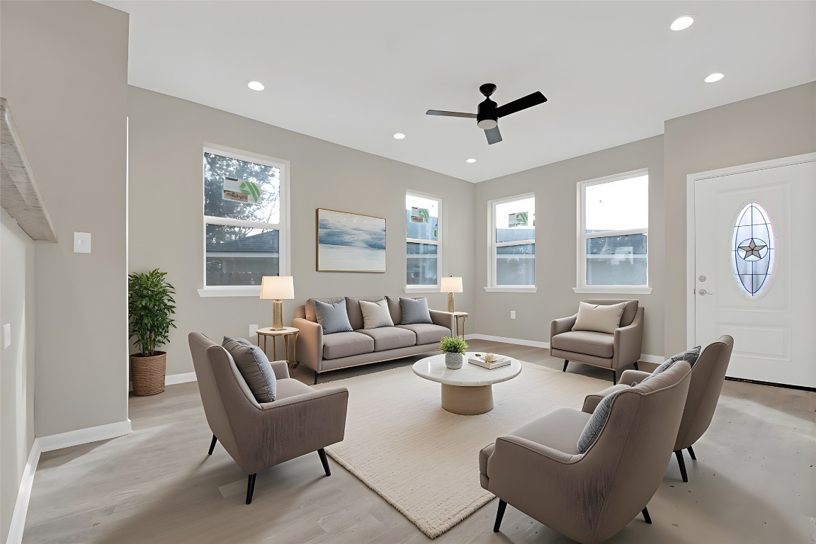 4913 Single Shot Circle, Unit B Austin, TX 78723 - Photo 5 of 21 a living room with furniture and a large window