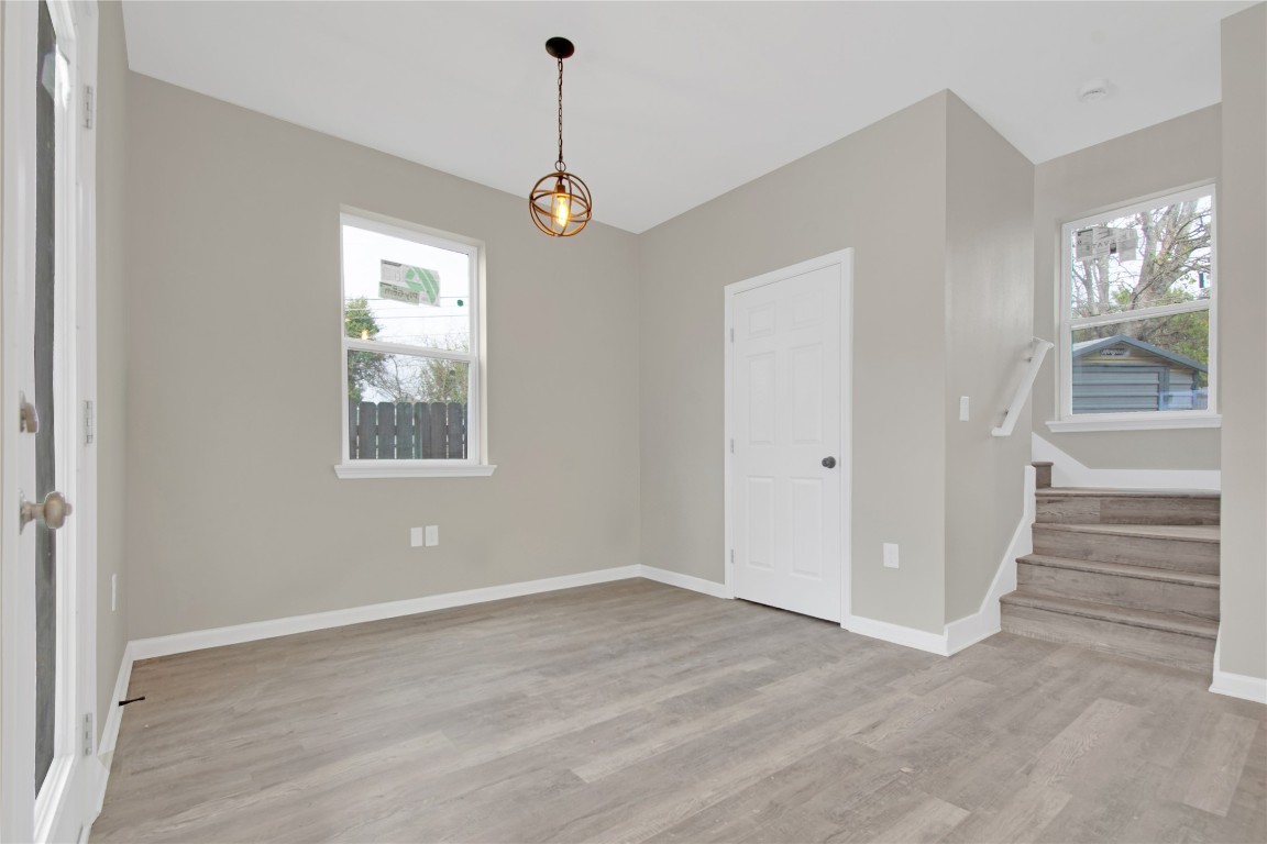 4913 Single Shot Circle, Unit B Austin, TX 78723 - Photo 8 of 21 a view of an empty room with a window