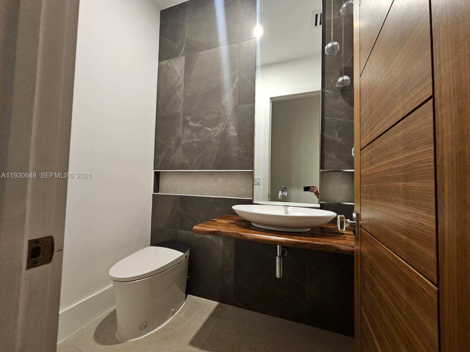 1821 Pinetree Road Winter Park, FL 32789 - Photo 21 of 26 Half Bathromm