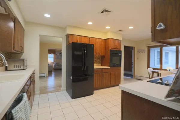 $699,000 | 18 Strathmore Village Drive, Centereach, NY 11720