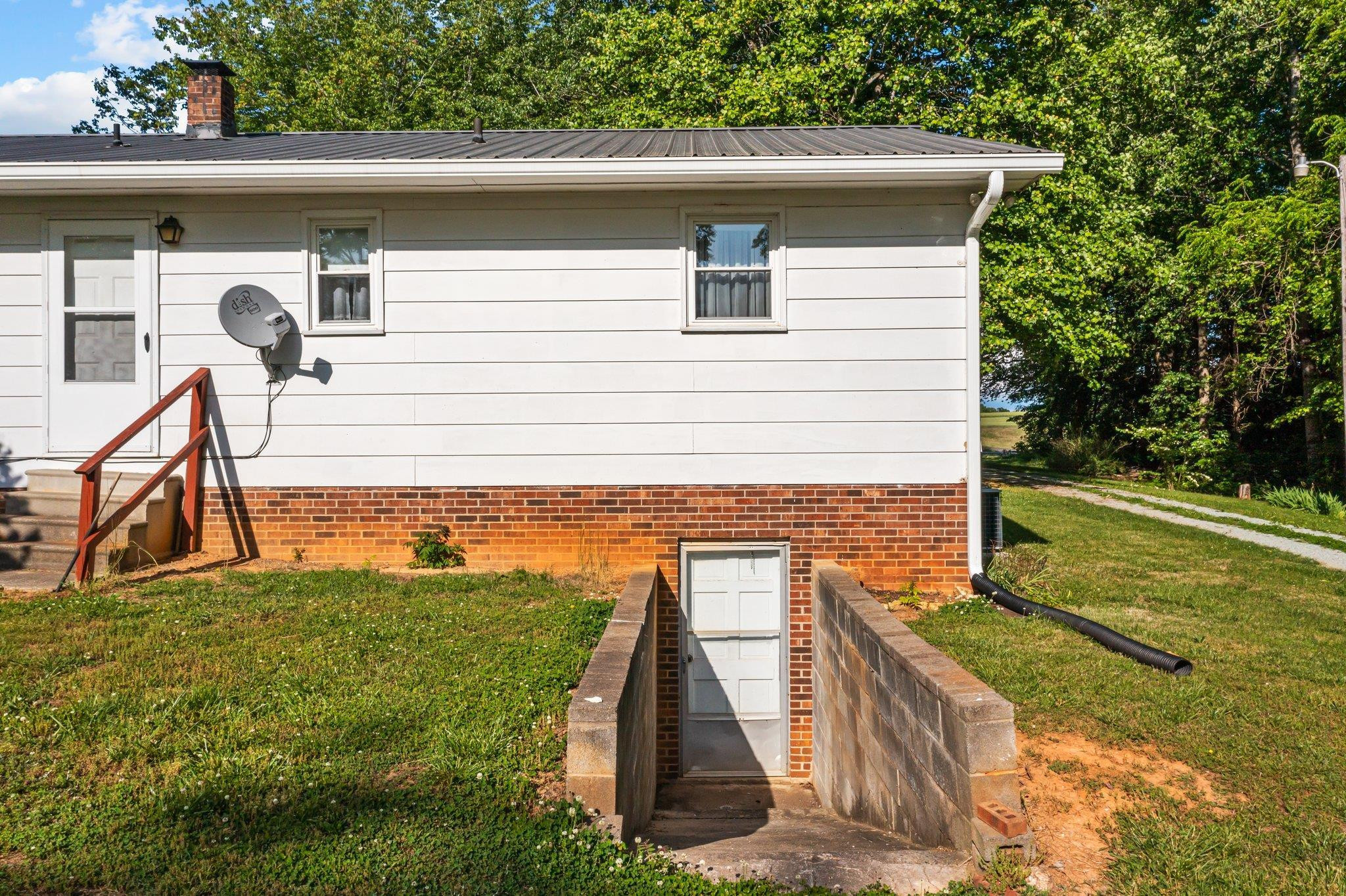 500 Tingen Mine Road Roxboro, NC 27574 - Photo 8 of 39 a view of front door of house