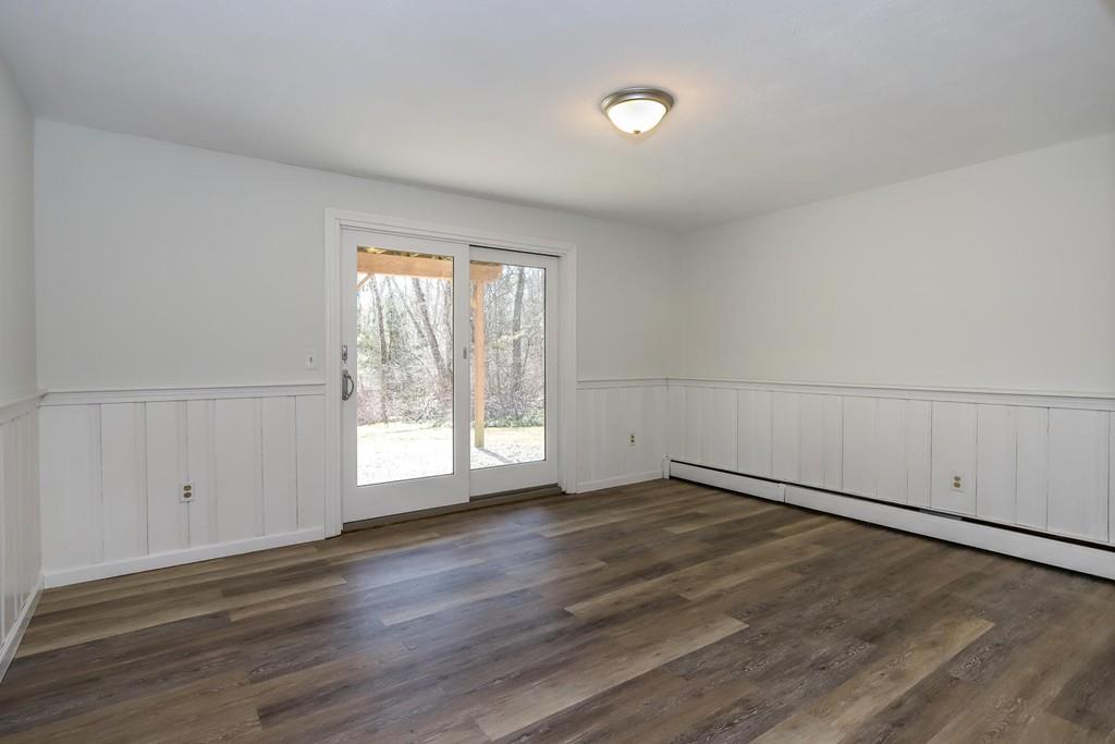 17 Longmeadow Road Medfield, MA 02052 - Photo 11 of 18 an empty room with wooden floor