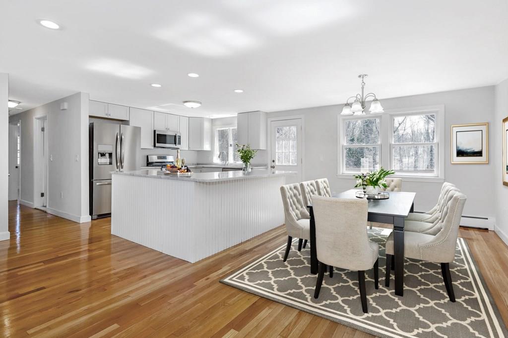 17 Longmeadow Road Medfield, MA 02052 - Photo 17 of 18 a view of a dining room with furniture and wooden floor