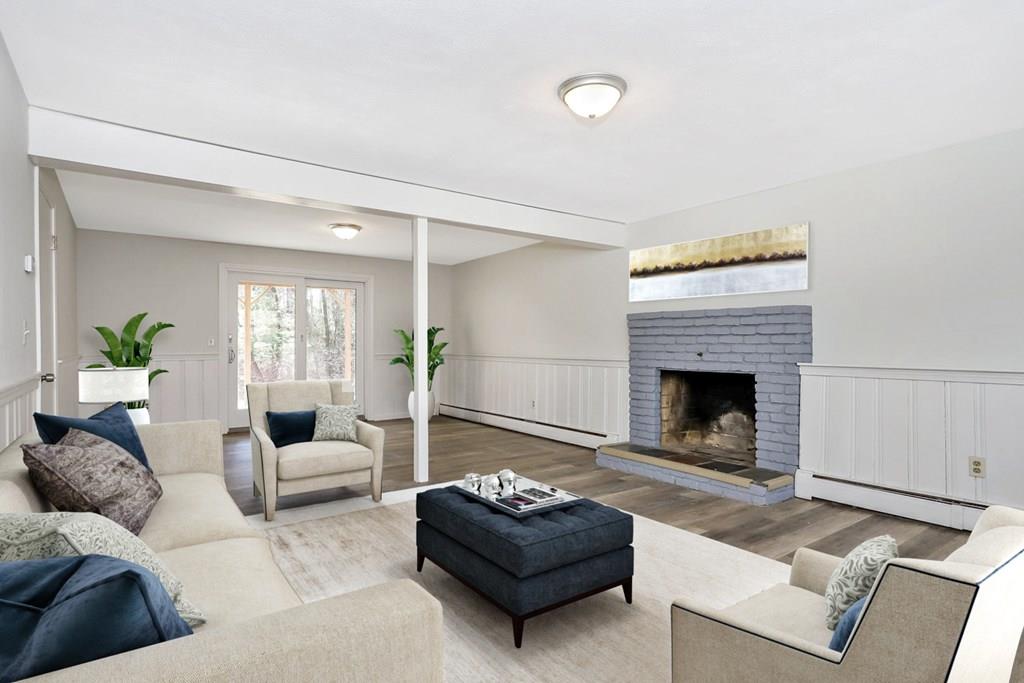 17 Longmeadow Road Medfield, MA 02052 - Photo 18 of 18 a living room with furniture and a fireplace