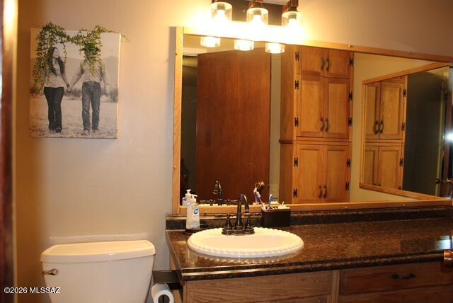 1201 East Old Stewart Road Willcox, AZ 85643 - Photo 32 of 49 a bathroom with a sink and a mirror