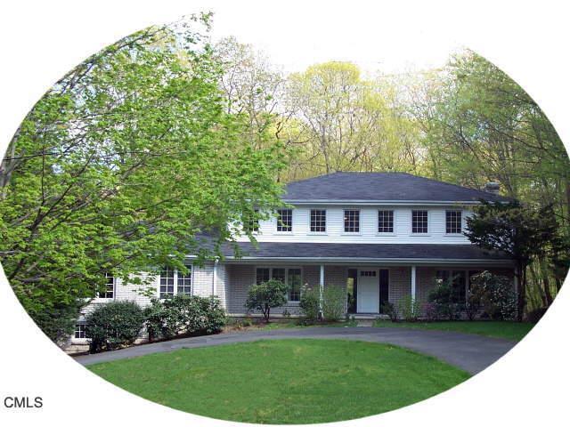 181 Lynam Road Stamford, CT 06903 - Photo 1 of 1 a front view of a house with a garden