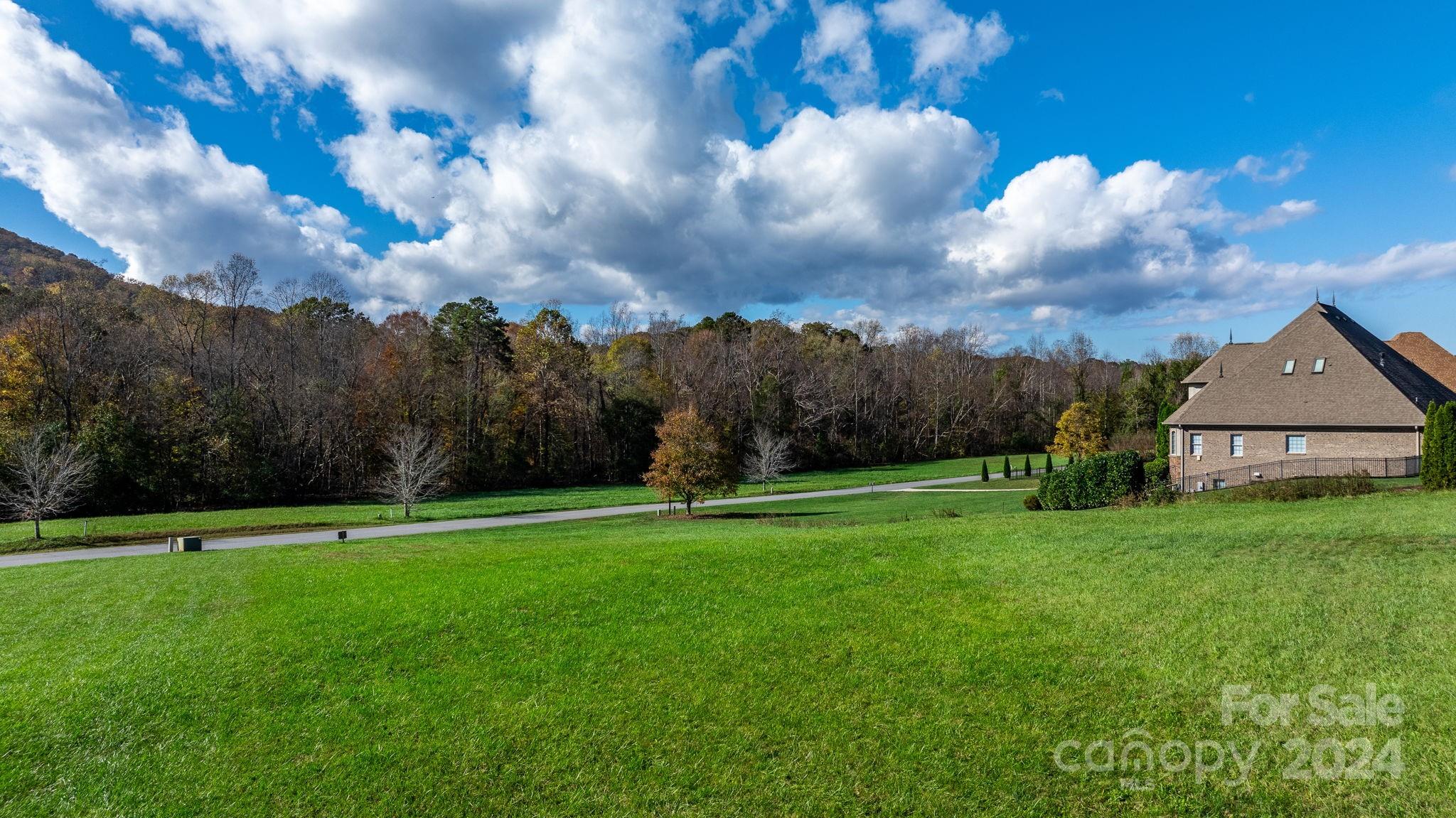 5944 Bakers Point Hickory, NC 28602 - Photo 12 of 22 a view of a golf course with a house