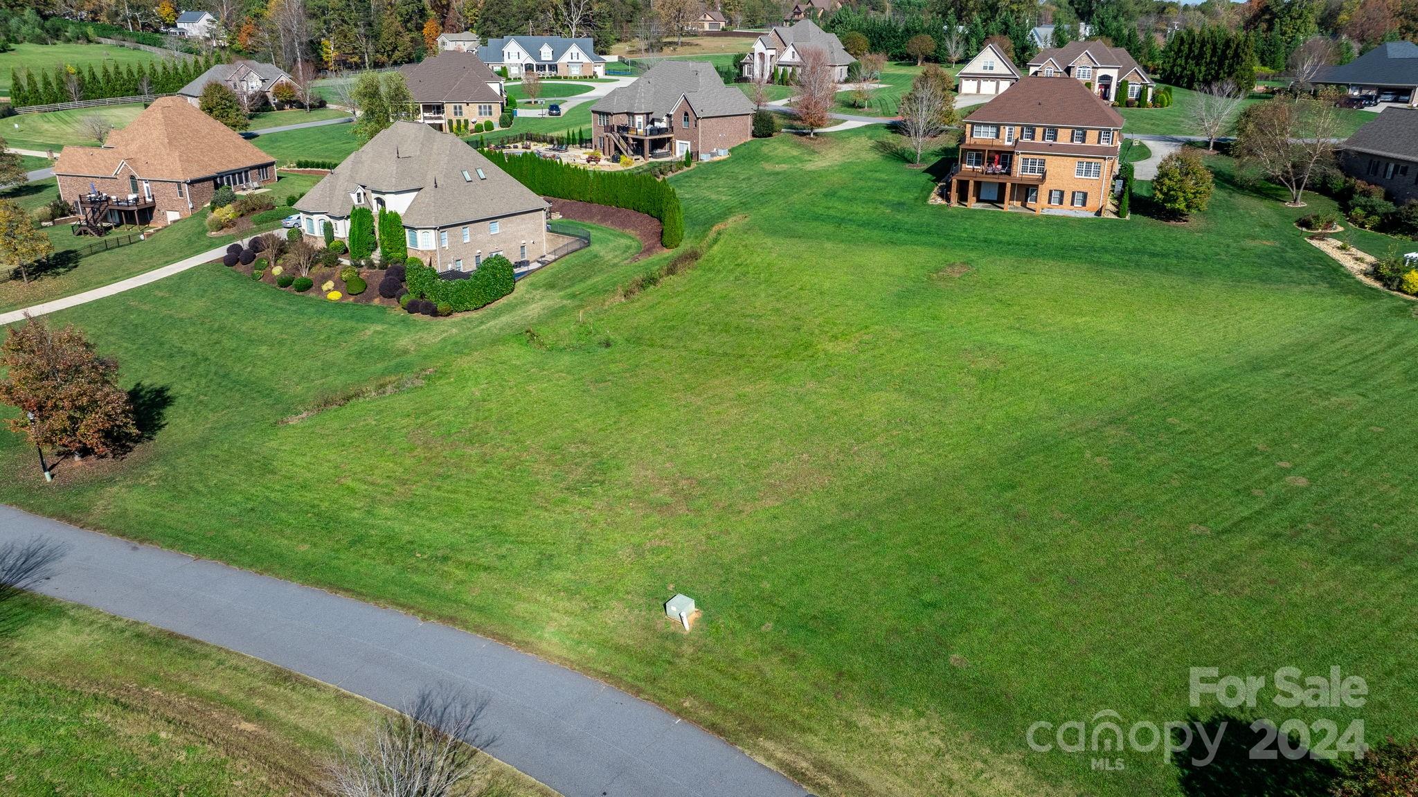 5944 Bakers Point Hickory, NC 28602 - Photo 13 of 22 an aerial view of a house with a garden