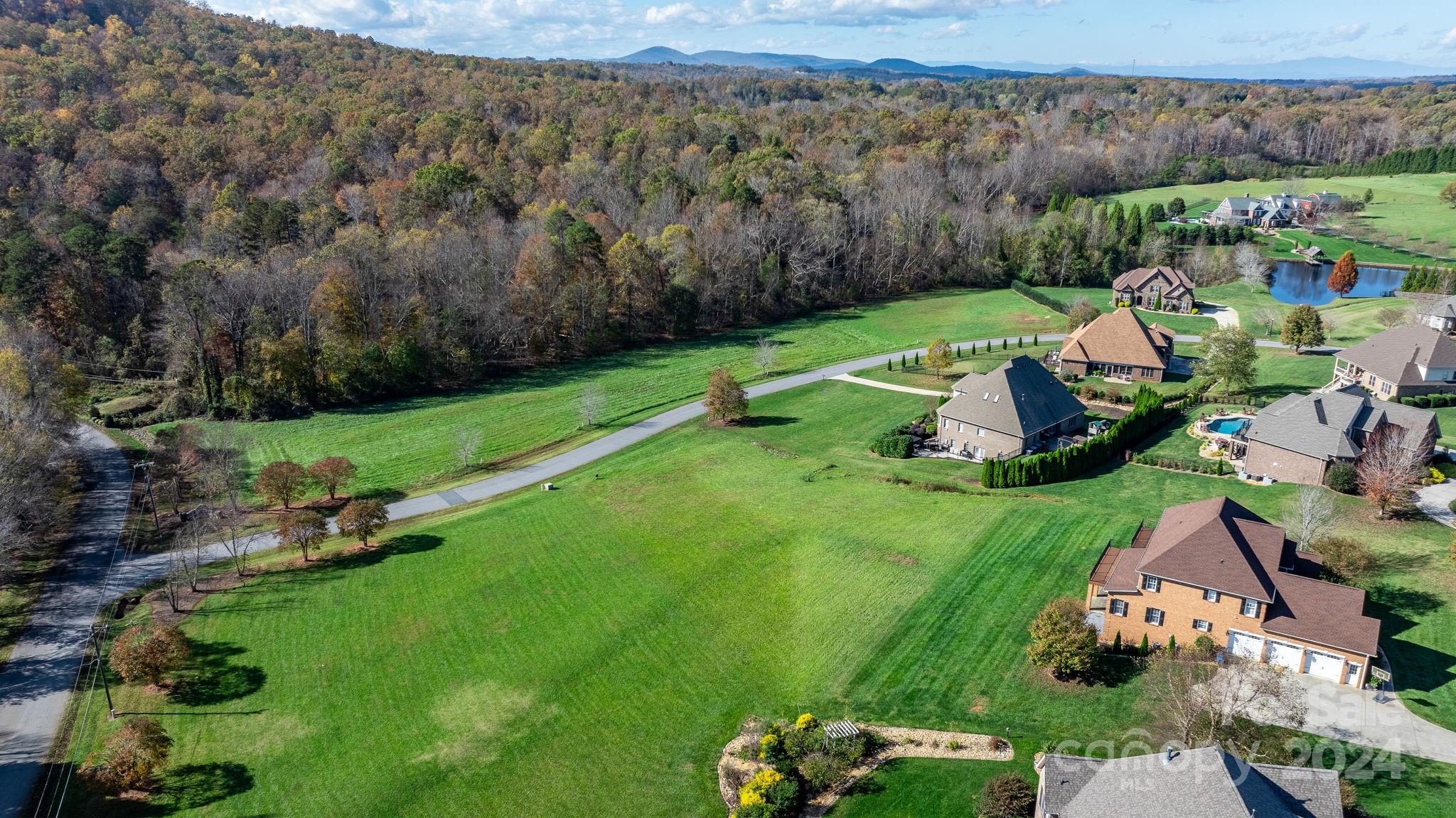 5944 Bakers Point Hickory, NC 28602 - Photo 18 of 22 an aerial view of a house with a yard