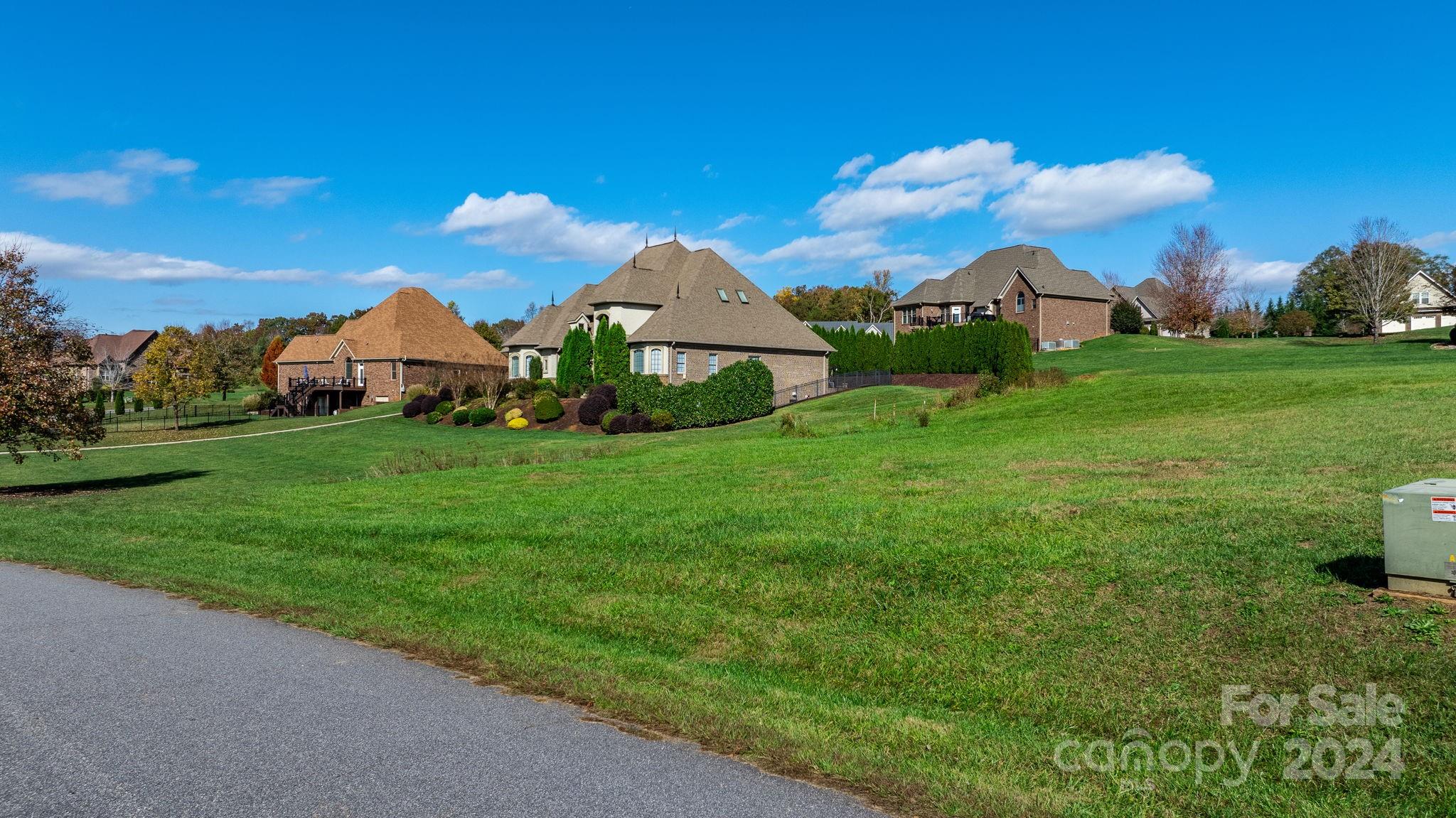 5944 Bakers Point Hickory, NC 28602 - Photo 6 of 22 a view of a garden with a house in the background