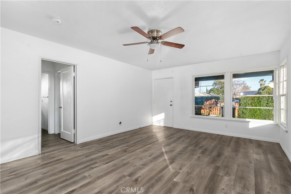 725 Michigan Avenue Beaumont, CA 92223 - Photo 6 of 20 a view of an empty room with a window
