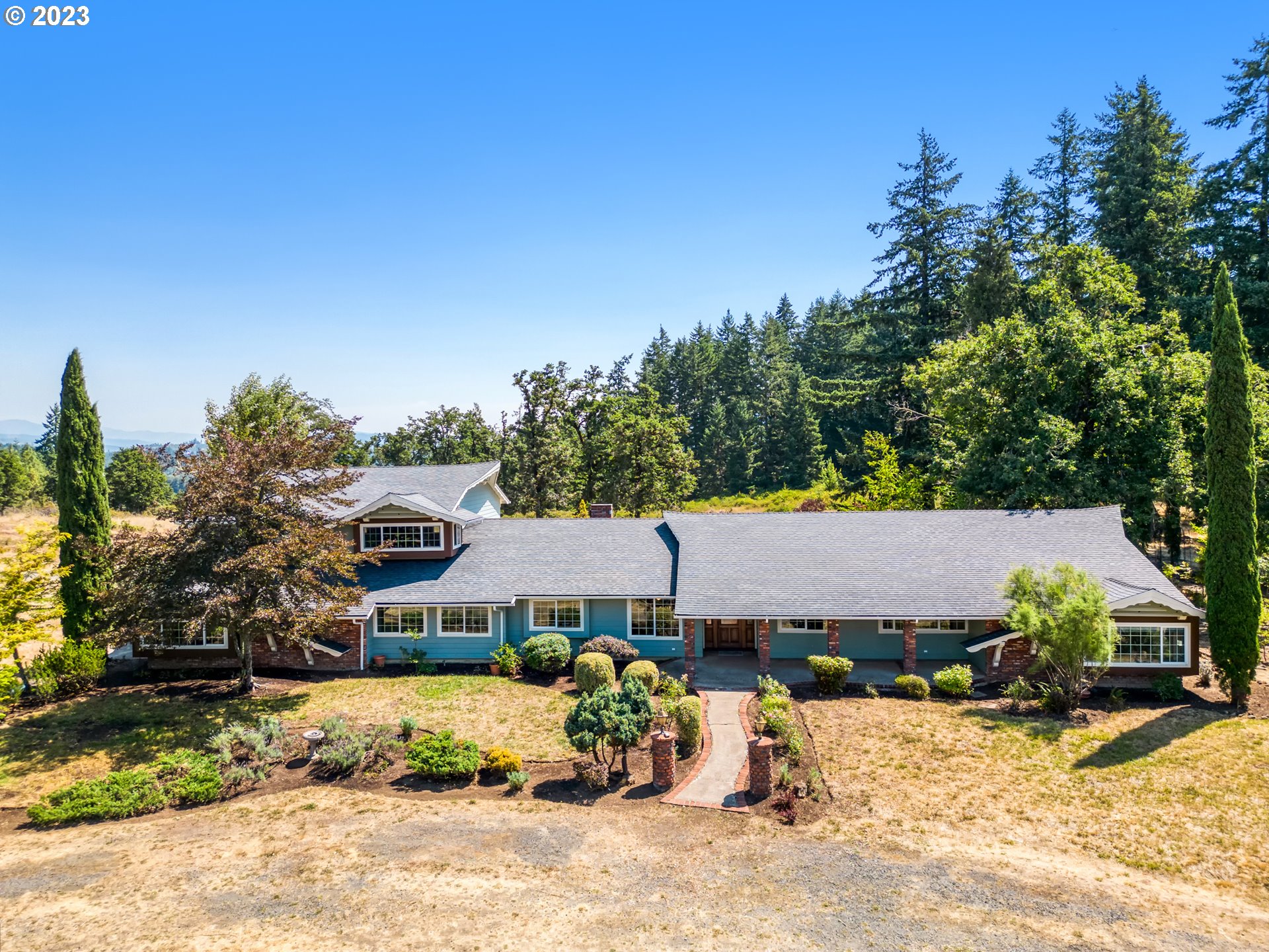 83369 Rattlesnake Road Dexter, OR 97431 - Photo 1 of 44 a view of a house with a yard