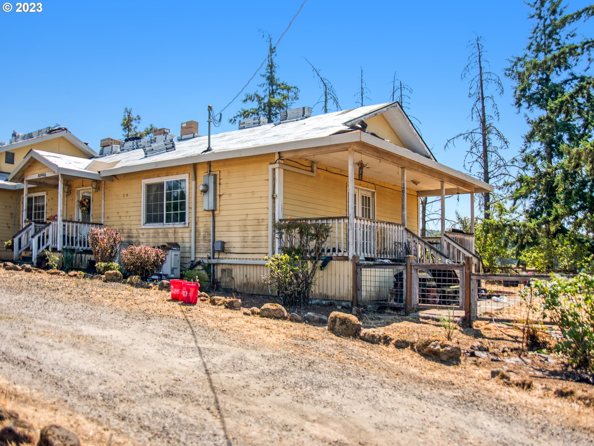 83369 Rattlesnake Road Dexter, OR 97431 - Photo 30 of 44 a front view of a house with a yard