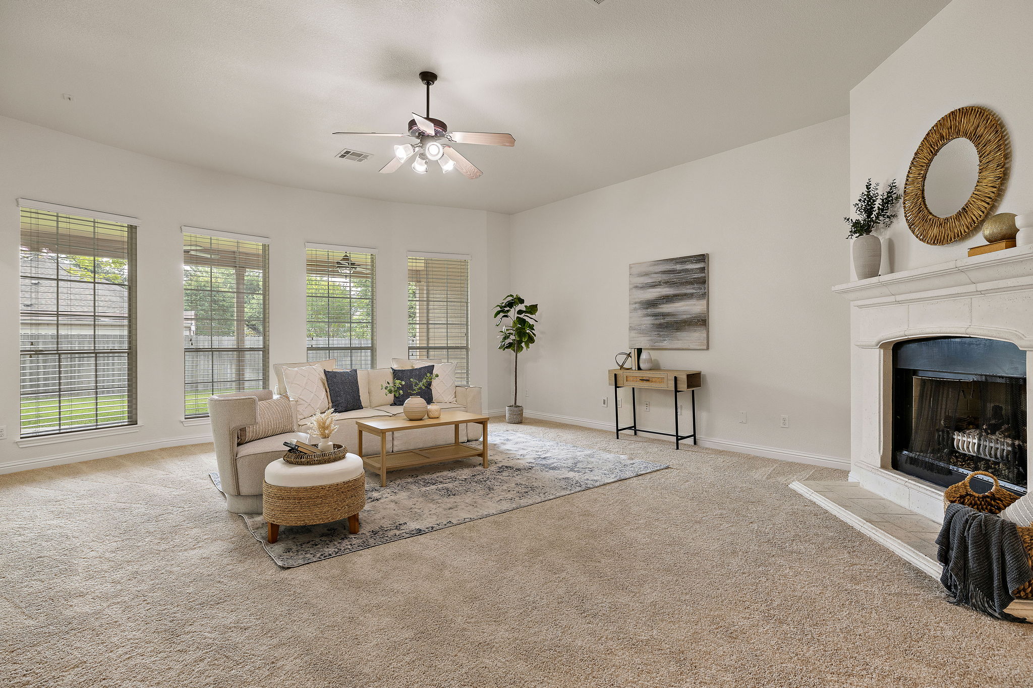 1115 Canyon Maple Road Pflugerville, TX 78660 - Photo 6 of 34 Large windows bring ample natural light into the main living area