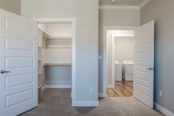 a view of a bathroom with a wardrobe space