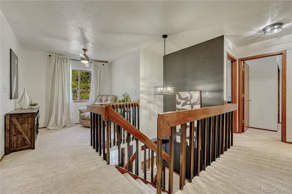 a view of entryway with livingroom