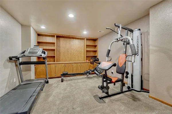 a view of a room with gym equipment
