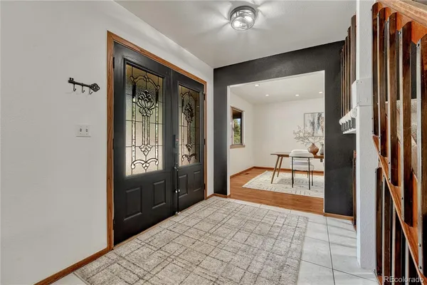 a spacious bathroom with a shower and a sink