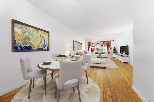 a living room with furniture and a table