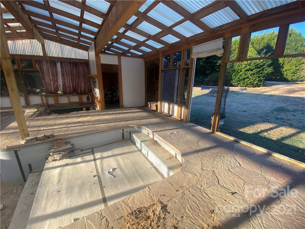 565 Burgray Road Woodleaf, NC 27054 - Photo 22 of 25 a view of a backyard of a house