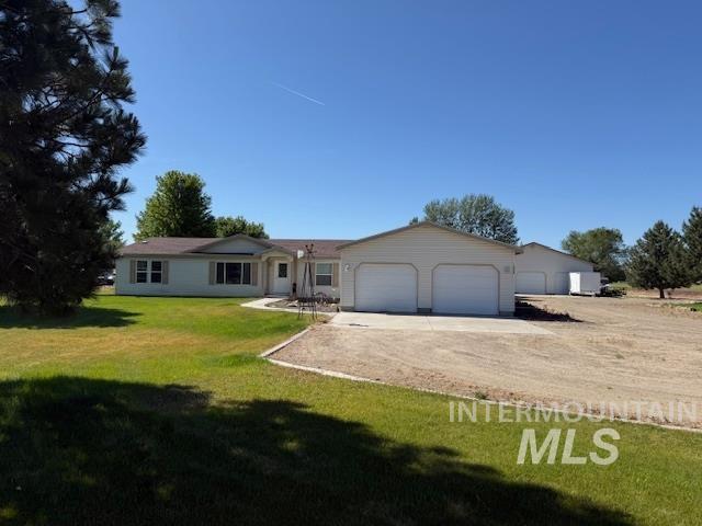 1095 County Road 70 Weiser, ID 83672 - Photo 3 of 44 Ranch-style residence featuring a prominent attached two-car garage