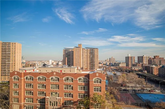 a view of a city with tall buildings